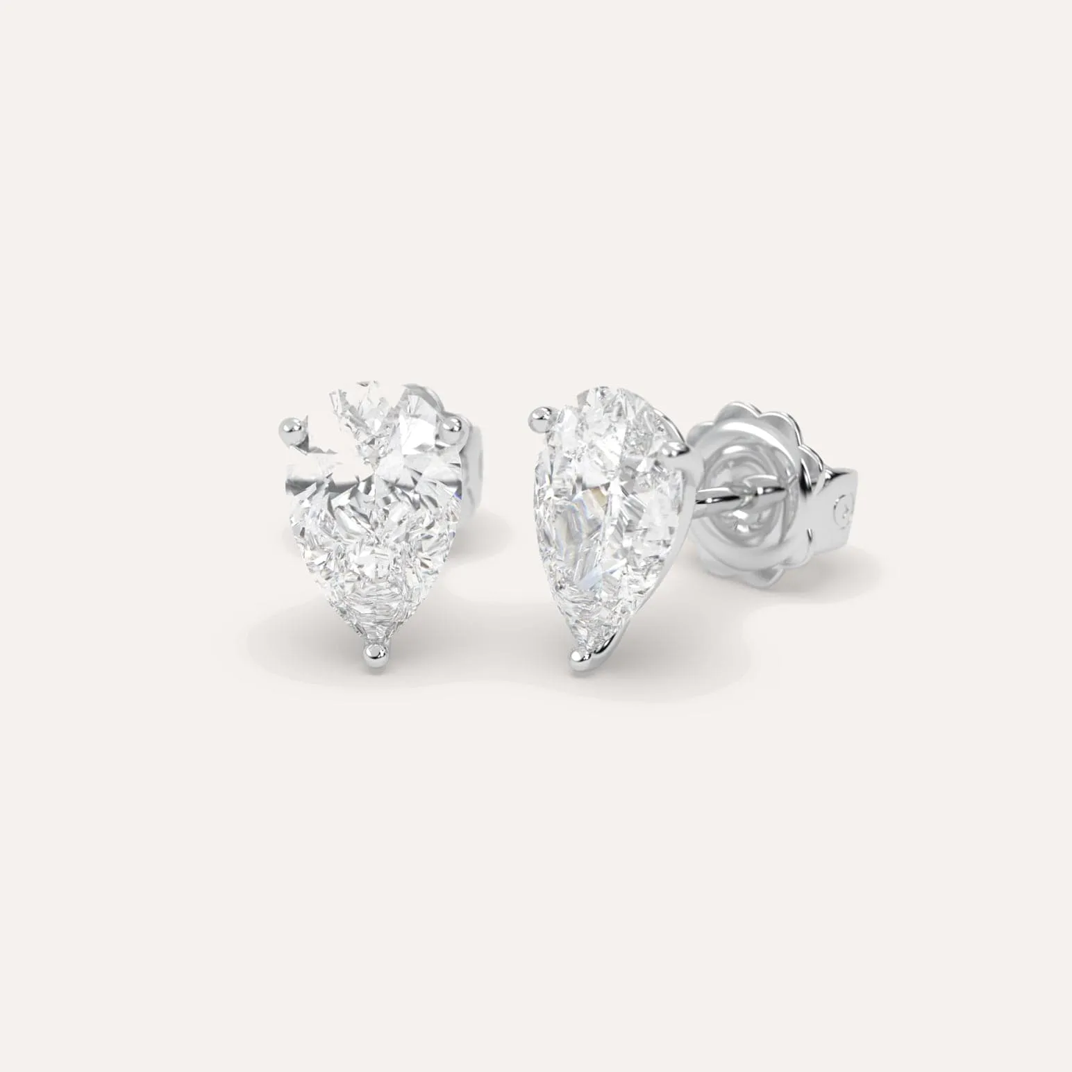 4 carat Pear Diamond Stud Earrings