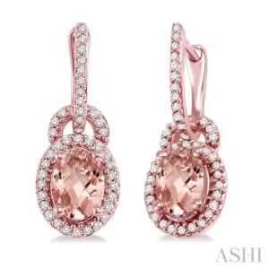 7x5 MM Oval Cut Morganite and 1/3 Ctw Round Cut Diamond Earrings in 14K Rose Gold