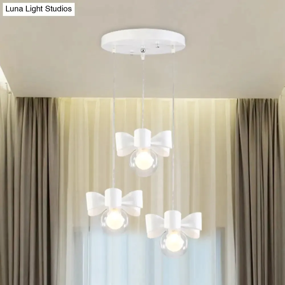 Contemporary White Pendant Light with Bow Design, Clear Glass, and 1/3 Lights