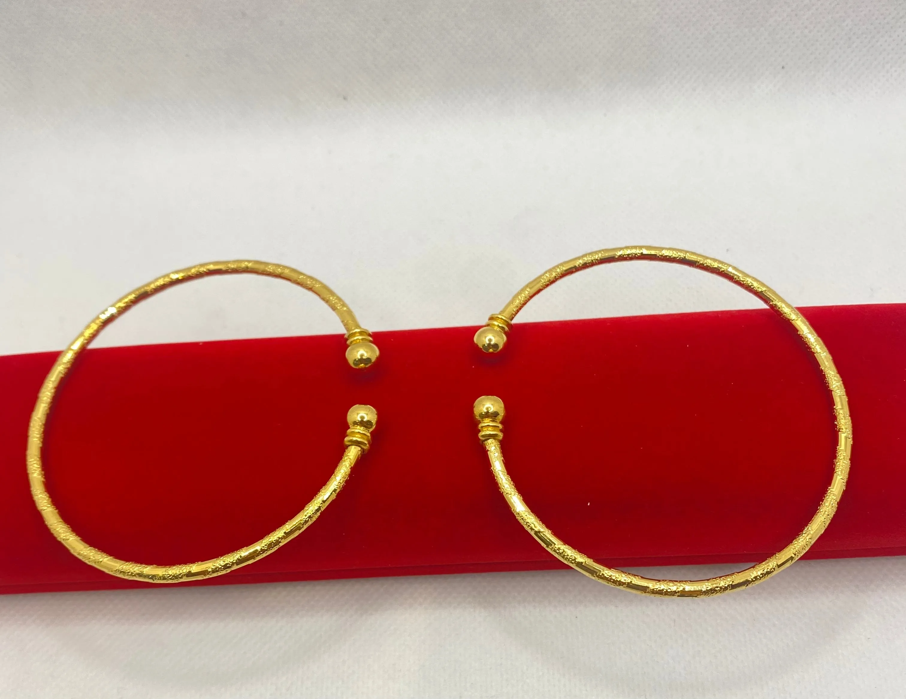 Gold plated free size bangles